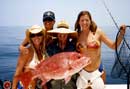 Holding snapper fish